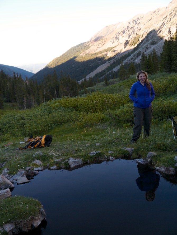 Angela waits for water to boil for dinner