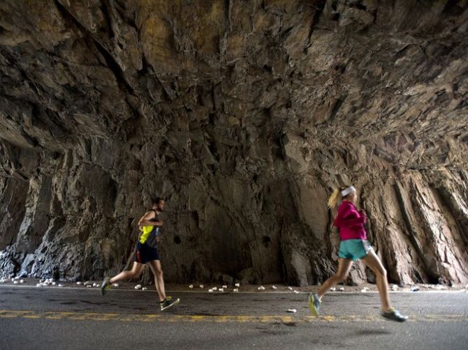 Running through a tunnel on the marathon route. (Photo courtesy of the Coloradian).