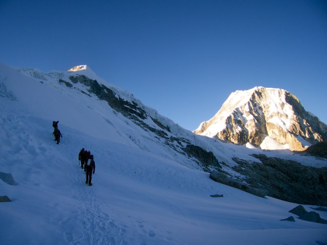 Ro-Ki-Ke ascending an easy section  of the Ishinca glacier with Ranrapalca in the the background 